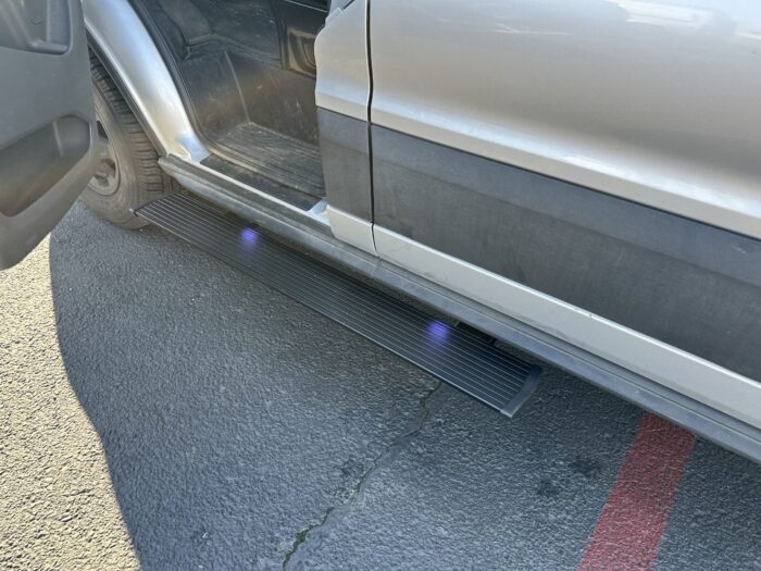 2023 Ford Transit Van Electric Power Step Running Boards Driver Side This is an image of the product for sale, that shows how it is utilized from a different angle