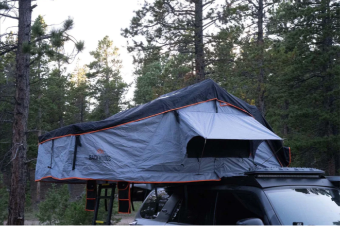 SUV roof top tent This is an image of the product for sale, that shows how it is utilized