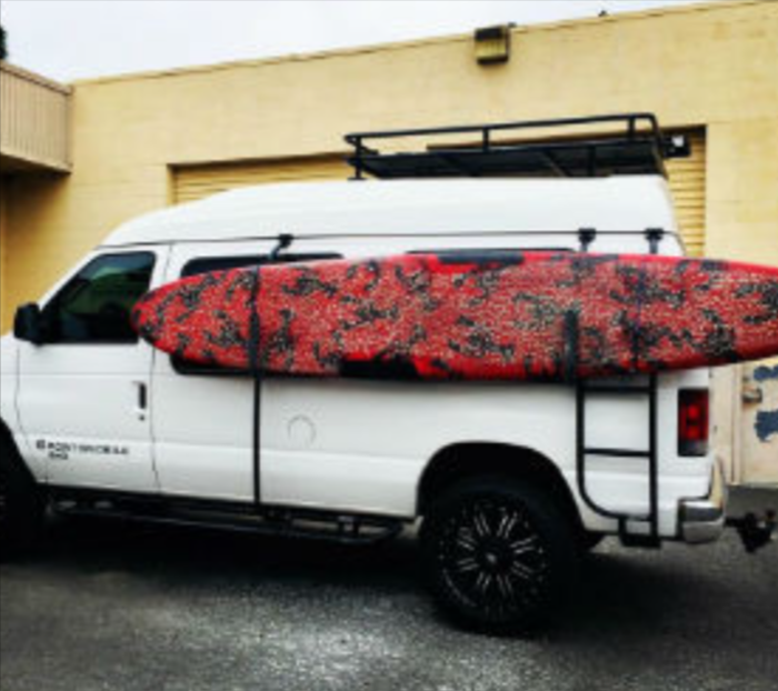 1992+ Ford Econoline Snow Board | Surf board pole This is an image of the product for sale, that shows how it is utilized