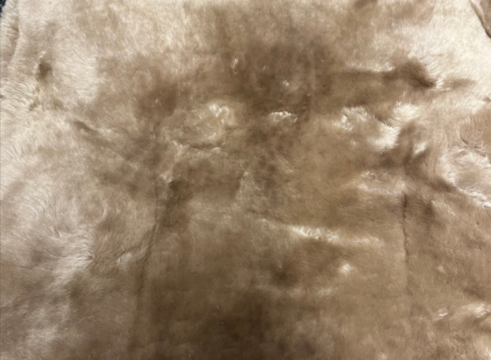 Ford-Econoline-Sheepskin-Seat-Cover this is a zoomed in image of the product that is for sale showcasing the texture